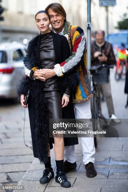 Mariacarla Boscono and Piero Piazzi are seen outside the Ferrari show during the Milan Fashion Week Womenswear Fall/Winter 2023/2024 on February 25,...