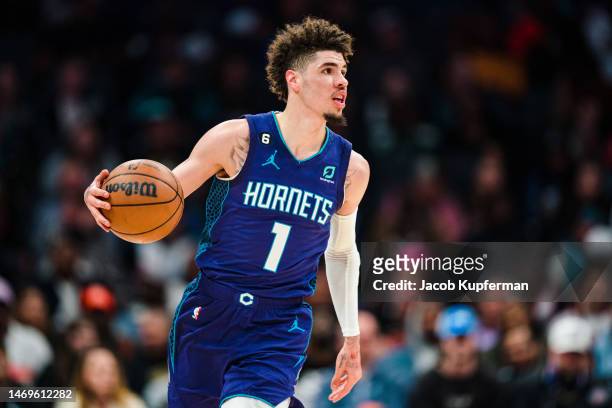 LaMelo Ball of the Charlotte Hornets brings the ball up court in the first quarter during their game against the Miami Heat at Spectrum Center on...