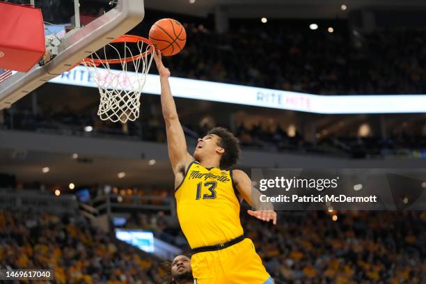 Oso Ighodaro of the Marquette Golden Eagles shoots the ball against the DePaul Blue Demons in the first half at Fiserv Forum on February 25, 2023 in...
