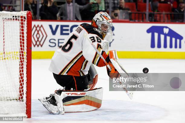 John Gibson of the Anaheim Ducks makes a save during the second period of the game against the Carolina Hurricanes at PNC Arena on February 25, 2023...