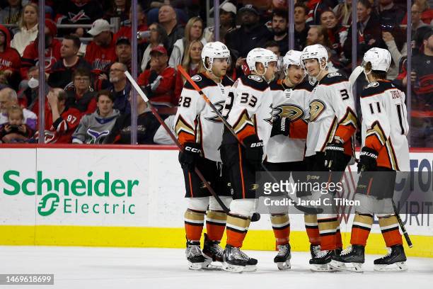 The Anaheim Ducks celebrate a goal scored by John Klingberg during the second period of the game against the Carolina Hurricanes at PNC Arena on...