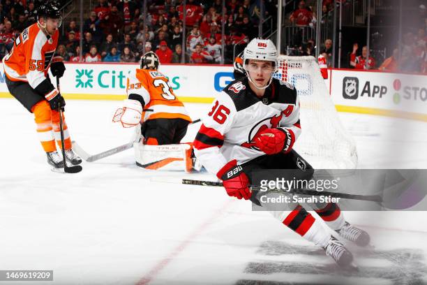 Jack Hughes of the New Jersey Devils reacts after scoring a goal during the second period against the Philadelphia Flyers at Prudential Center on...