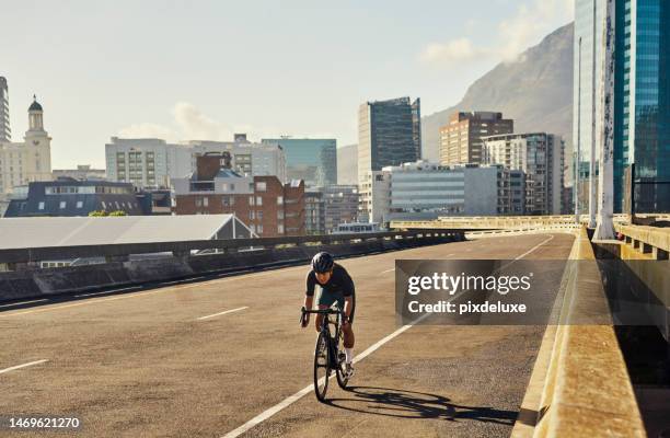 bike, road and mockup with a woman cycling on a brige in the city for cardio or endurance exercise. bicycle, street and fitness with a female cyclist or athlete riding outdoor on an urban background - center athlete stock pictures, royalty-free photos & images