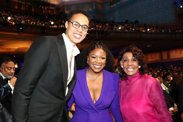 Brittney Griner, Cherelle Griner, and United States Representative Maxine Waters attend the 54th NAACP Image Awards at Pasadena Civic Auditorium on...