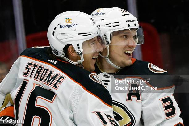 Jakob Silfverberg of the Anaheim Ducks celebrates a goal scored with teammate Ryan Strome during the third period of the game against the Carolina...