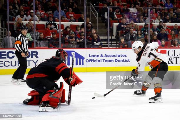 Frederik Andersen of the Carolina Hurricanes makes a save against Frank Vatrano of the Anaheim Ducks during the third period of the game at PNC Arena...
