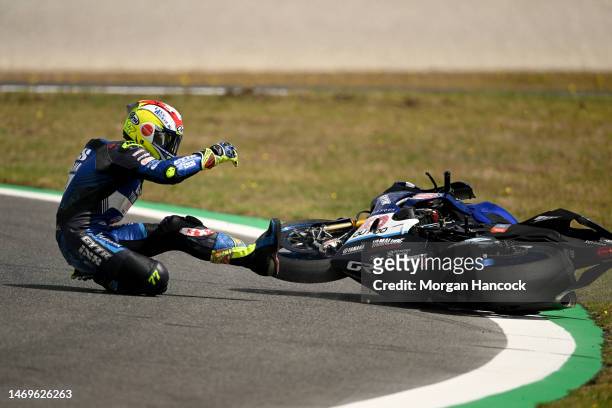 Dominique Aegerter of Switzerland falls off the GYTR GRT Yamaha WorldSBK Team Yamaha YZF R1 in the Superpole race during the 2022 MOTUL FIM Superbike...