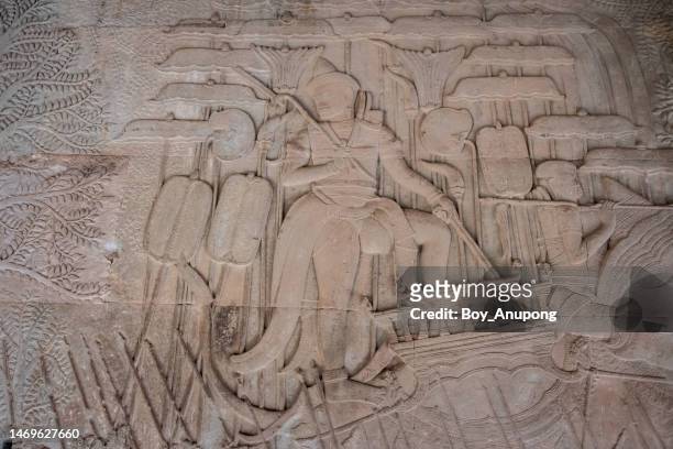 a bas-relief of king suryavarman ii depicted at angkor wat, cambodia. angkor wat, the world’s largest religious structure. - king stock pictures, royalty-free photos & images