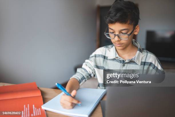 boy studying online at home - bright future stock pictures, royalty-free photos & images