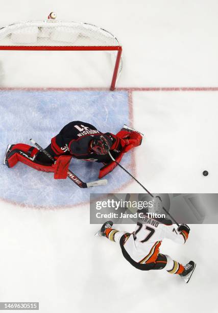 Frank Vatrano of the Anaheim Ducks attempts a shot against Frederik Andersen of the Carolina Hurricanes during the third period of the game at PNC...