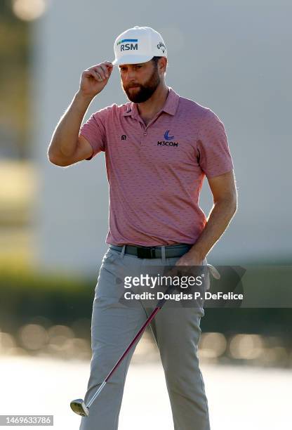 Chris Kirk of the United States reacts after a putt on the 17th hole during the third round of The Honda Classic at PGA National Resort And Spa on...