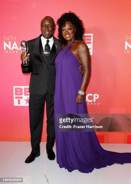 Social Justice Impact Award winner Benjamin Crump and Outstanding Actress In A Motion Picture award winner Viola Davis pose in the press room during...