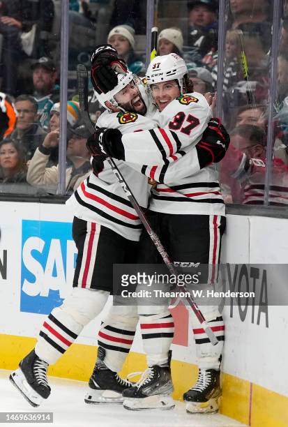 David Gust and Colin Blackwell of the Chicago Blackhawks celebrate after Gust scored a goal against the San Jose Sharks during the first period at...