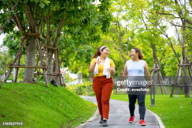 group of people are going to work out at the park. - encouragement stock pictures, royalty-free photos & images