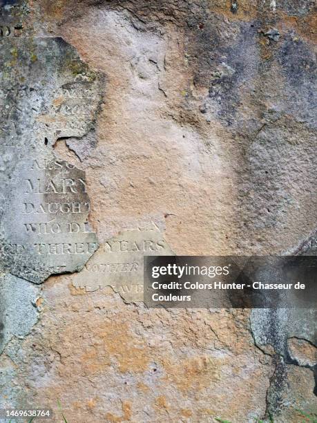 anonymous funerary stele in weathered and cracked stone in brompton cemetery in london (england) - knightsbridge stock pictures, royalty-free photos & images