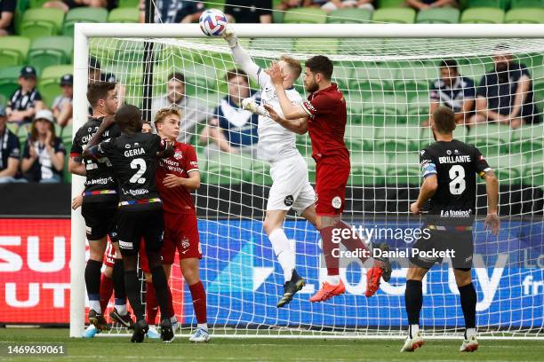 Adelaide United goalkeeper Joe Gauci saves a shot on goal during the round 18 A-League Men's match between Melbourne Victory and Adelaide United at...