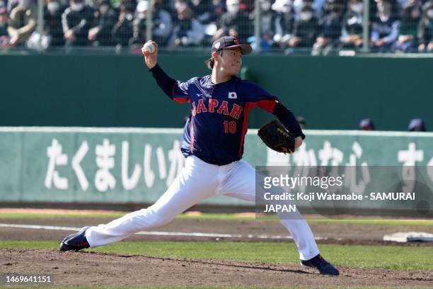 Pitcher Yoshinobu Yamamoto of Samurai Japan throws in the first inning during the practice game between Samurai Japan and Fukuoka SoftBank Hawks at...