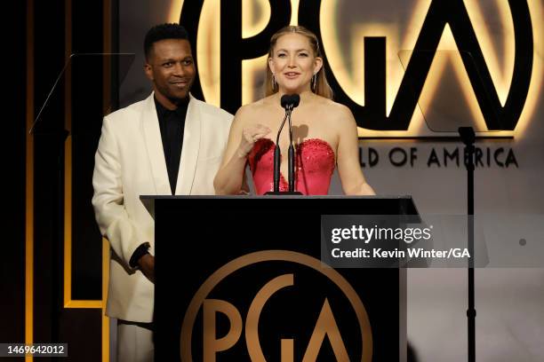 Leslie Odom Jr. And Kate Hudson speak onstage during the 2023 Producers Guild Awards at The Beverly Hilton on February 25, 2023 in Beverly Hills,...