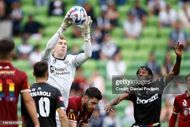Adelaide United goalkeeper Joe Gauci saves a shot on goal during the round 18 A-League Men's match between Melbourne Victory and Adelaide United at...