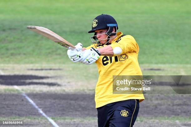 Josh Philippe of Western Australia hits a boundary during the Marsh One Day Cup match between Tasmania and Western Australia at Blundstone Arena, on...