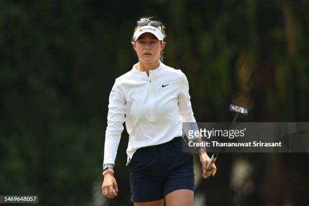 Nelly Korda of United States looks on putting green after finish putt at 8th hole during the final round of the Honda LPGA Thailand at Siam Country...