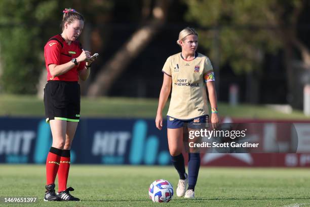 Referee Bec Mackie writes a penalty in her book during the round 15 A-League Women's match between Newcastle Jets and Western United at No. 2 Sports...