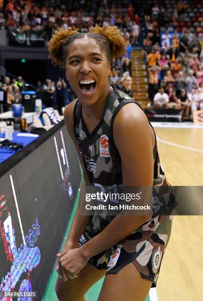 Tianna Hawkins of the Fire celebrates after winning the round 15 WNBL match between Townsville Fire and Sydney Flames at Townsville Entertainment...