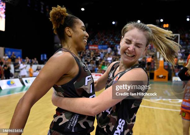 Tianna Hawkins and Karlie Samuelson of the Fire celebrate after winning the round 15 WNBL match between Townsville Fire and Sydney Flames at...