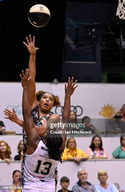 Tianna Hawkins of the Fire shoots the match wining shot during the round 15 WNBL match between Townsville Fire and Sydney Flames at Townsville...