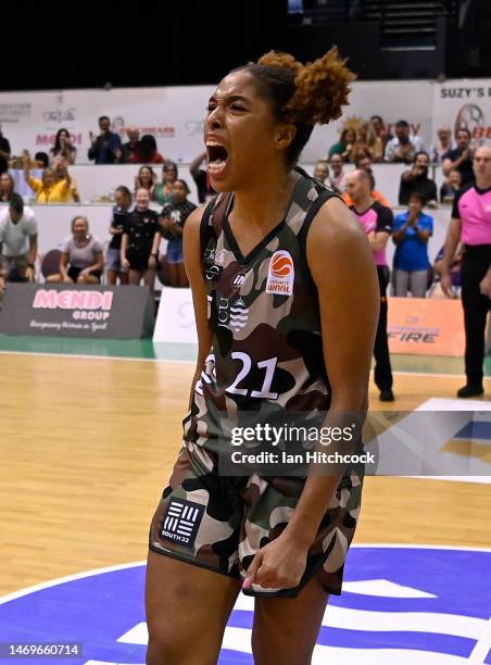 Tianna Hawkins of the Fire celebrates after winning the round 15 WNBL match between Townsville Fire and Sydney Flames at Townsville Entertainment...