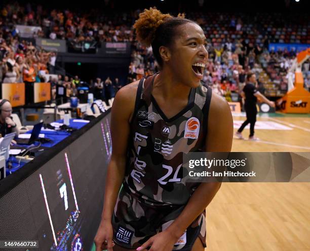 Tianna Hawkins of the Fire celebrates after winning the round 15 WNBL match between Townsville Fire and Sydney Flames at Townsville Entertainment...