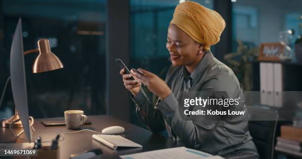 worker, phone or credit card in night office on financial app, business investment or e commerce website payment. happy, black woman or online shopping for late business on mobile finance technology - paying employees stock pictures, royalty-free photos & images
