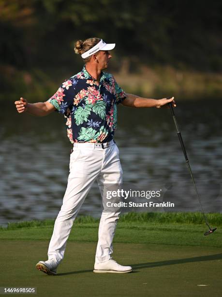 Marcel Siem of Germany reacts after putting on the 18th green to win the Hero Indian Open at Dlf Golf and Country Club on February 26, 2023 in India.