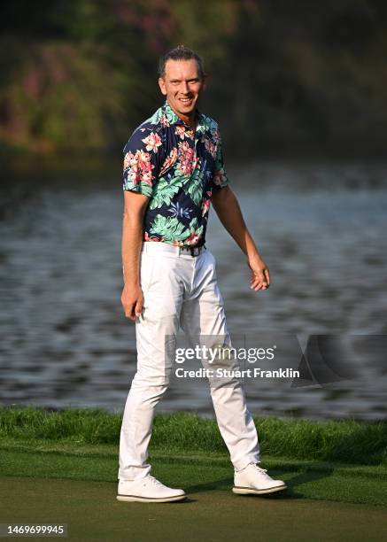 Marcel Siem of Germany reacts after putting on the 18th green to win the Hero Indian Open at Dlf Golf and Country Club on February 26, 2023 in India.