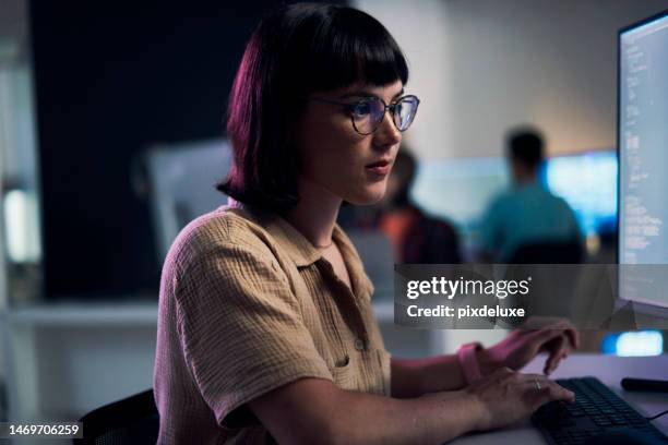 concentrating, computer and night with woman and coding for software engineering, developer and designer. cyber security, data science and code with employee in office for neon, website and html - html stock pictures, royalty-free photos & images