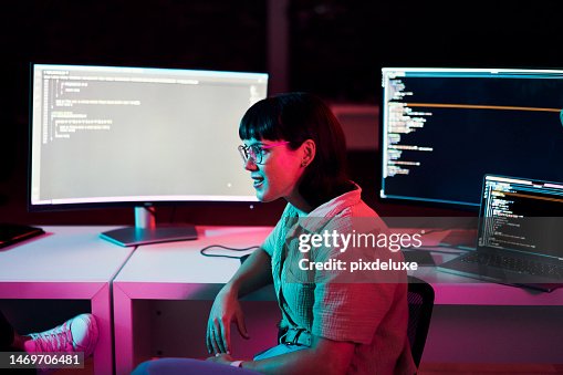 Computer coding, html script and woman programming, software development or cyberpunk in neon. Night or dark room for information technology, code and programmer geek or person on data monitor screen Computer coding, html script and woman programming, software development or cyberpunk in neon. Night or dark room for information technology, code and programmer geek or person on data monitor screen