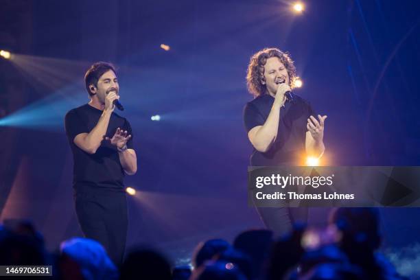 Max Giesinger and Michael Schulte perform on stage during the Giovanni Zarrella Show on February 25, 2023 in Offenburg, Germany.