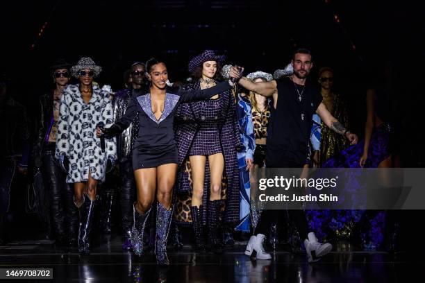 Designer Philipp Plein walks the runway with models during finale at the Philipp Plein fashion show during the Milan Fashion Week Womenswear...