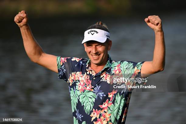 Marcel Siem of Germany celebrates after putting on the 18th green to win the Hero Indian Open at Dlf Golf and Country Club on February 26, 2023 in...