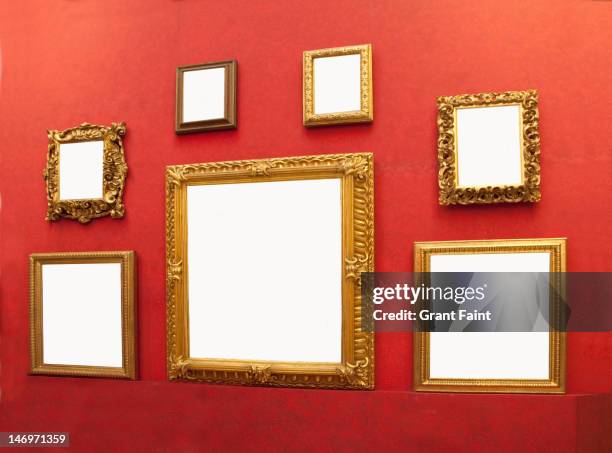 display of blank frames. - red grant stock-fotos und bilder