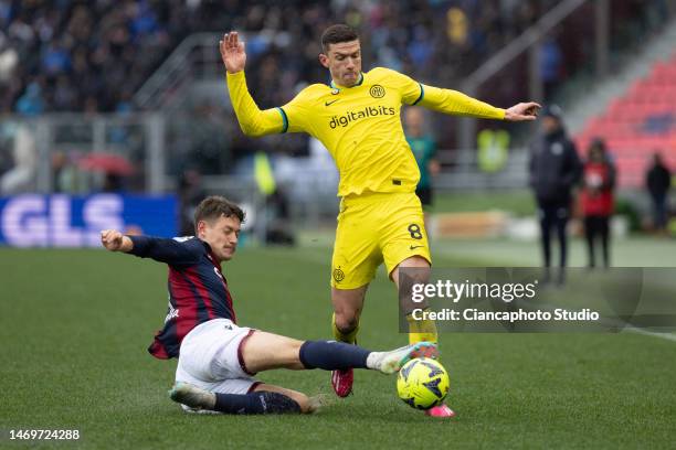 Robin Gosens of FC Internazionale competes for the ball with Joaquin Sosa of Bologna FC during the Serie A match between Bologna FC and FC...