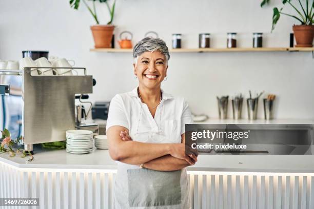 cafe, portrait and woman or business owner with startup success, proud of restaurant service and management. indian senior person in coffee shop or modern cafeteria with welcome smile or career goals - indian ethnicity south africa stock pictures, royalty-free photos & images