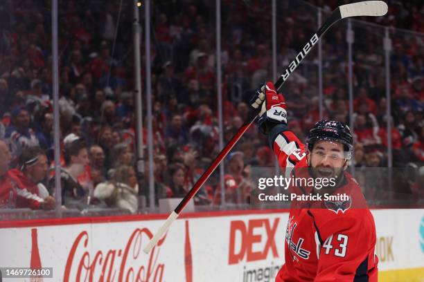 Tom Wilson of the Washington Capitals celebrates after scoring a goal against the New York Rangers during the second period at Capital One Arena on...