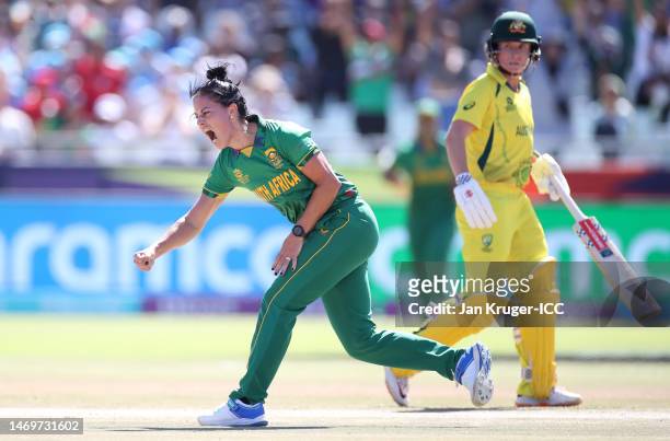 Marizanne Kapp of South Africa celebrates the wicket of Alyssa Healy of Australia during the ICC Women's T20 World Cup Final match between Australia...