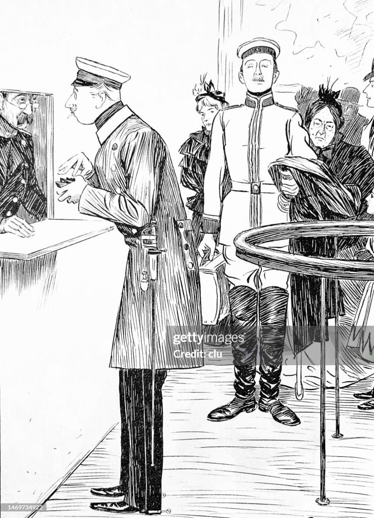 Man buys a train ticket at the counter, other people waiting behind him