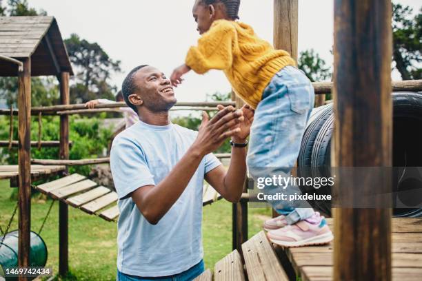 love, black father and girl in park, playful and bonding together, weekend break and happiness. family, dad and daughter outdoor, cheerful and loving with smile, joyful and child development outside - jungle gym stock pictures, royalty-free photos & images