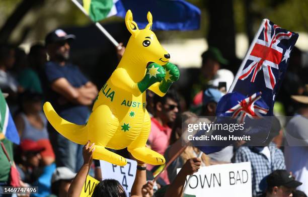 Spectators react in the crowd during the ICC Women's T20 World Cup Final match between Australia and South Africa at Newlands Stadium on February 26,...