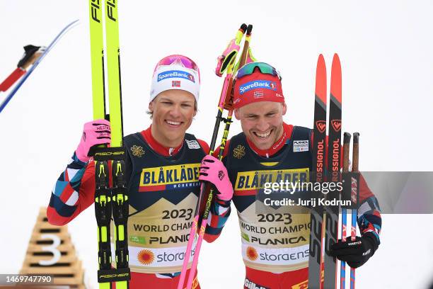 Gold medalists, Johannes Hoesflot Klaebo and Paal Golberg of Team Norway celebrate victory following the Men's Final in the Cross-Country Team Sprint...