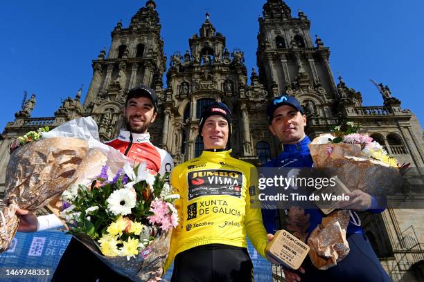 Jesús Herrada of Spain and Team Cofidis on third place, race winner Jonas Vingegaard of Denmark and Team Jumbo-Visma - Yellow Leader Jersey and Ruben...