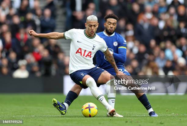 Richarlison of Tottenham Hotspur is challenged by Reece James of Chelsea during the Premier League match between Tottenham Hotspur and Chelsea FC at...
